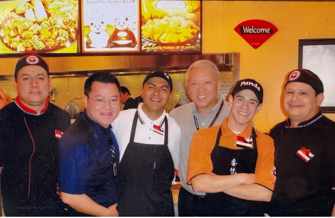 Wang during a store visit with Co-Founder Andrew Cherng